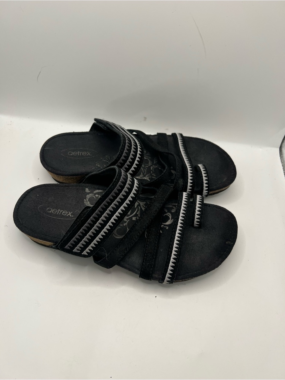 Aetrex Black Slip-On Sandals with White Zigzag Trim - Picture 9 of 10